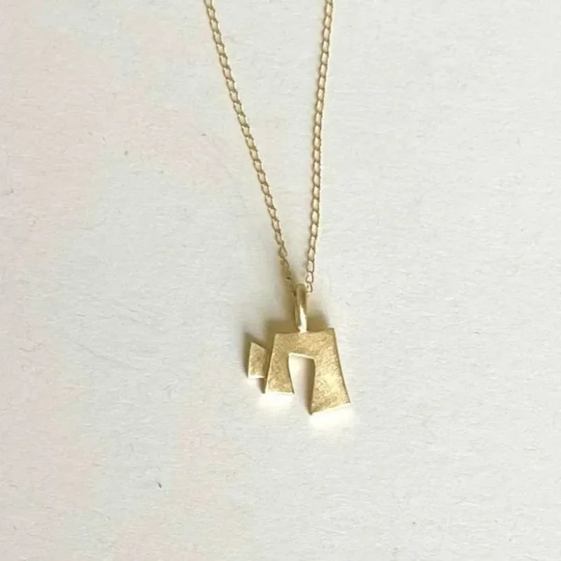 14k gold little chai necklace by emily rosenfeld