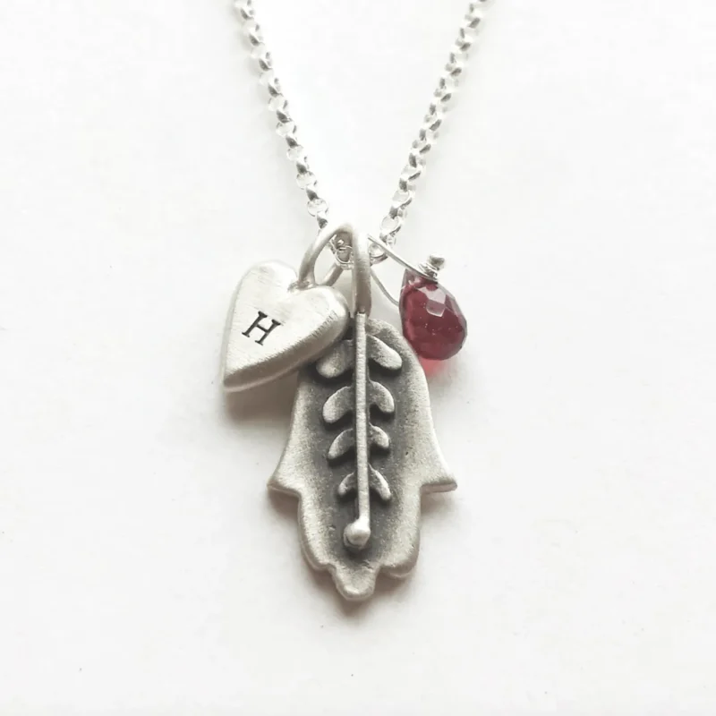 botanical hamsa necklace in hebrew emily rosenfeld