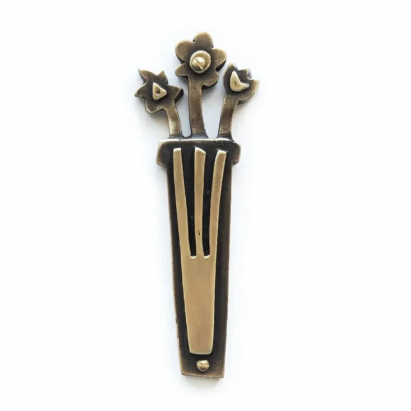 brass flower mezuzah by emily rosenfeld