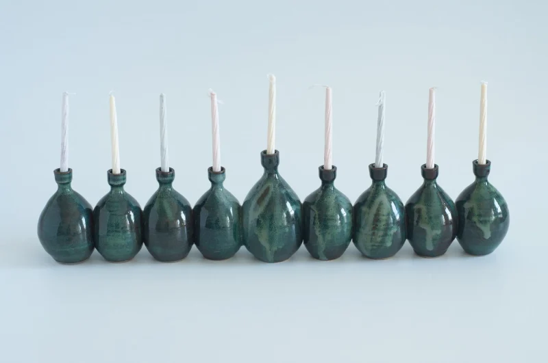 dark blue ceramic menorah by rachael pots