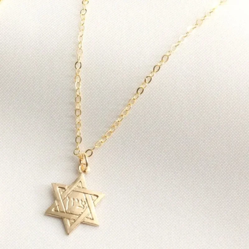 elegant gold star of david necklace