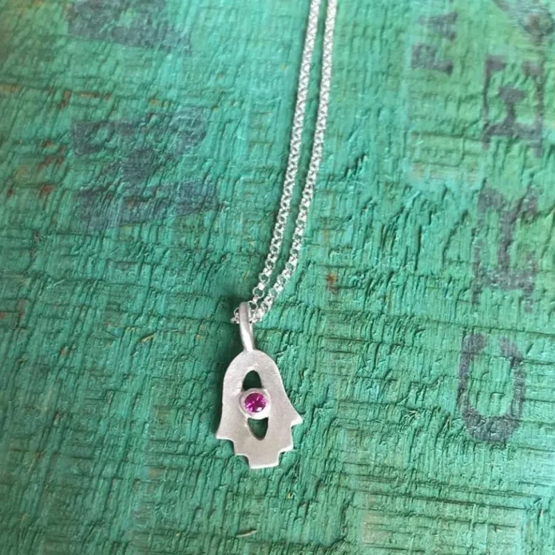 emily rosenfeld tiny hamsa amulet with gemstone options