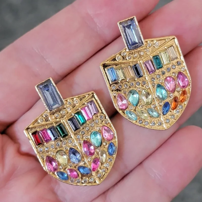 jeweled gold dreidel earrings unique mismatched design