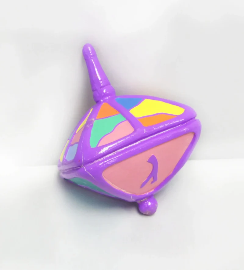 multicolor clay dreidel fuschia top scaled