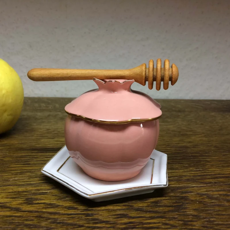 pink porcelain honey jar set with dipper coaster