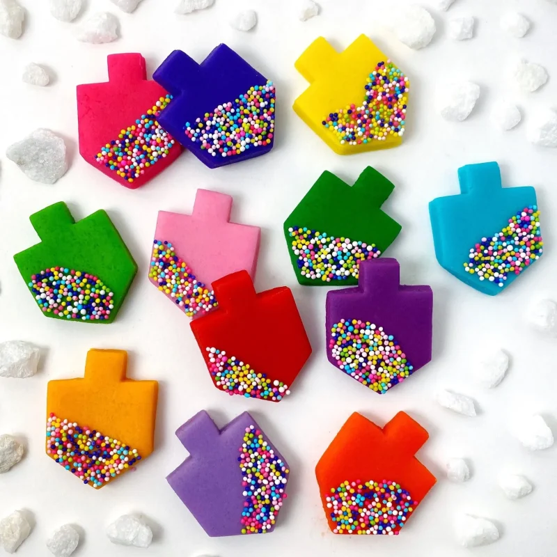 rainbow blue marzipan dreidel tiles with sprinkles