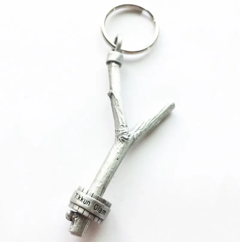 tikkun olam prayer wheel keychain by emily rosenfeld