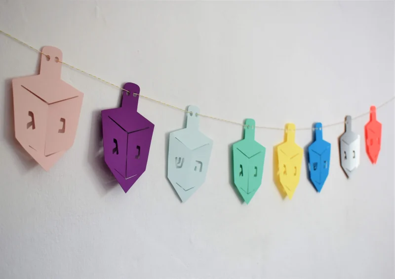 vibrant multicolor dreidel garland for festive decor scaled