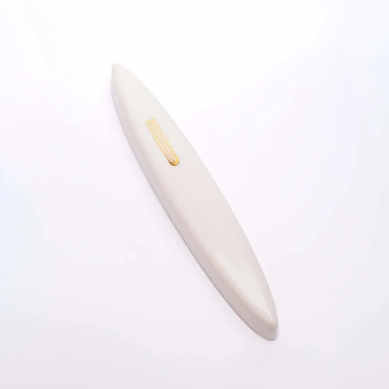 white ceramic mezuzah case w gold shin mickala design