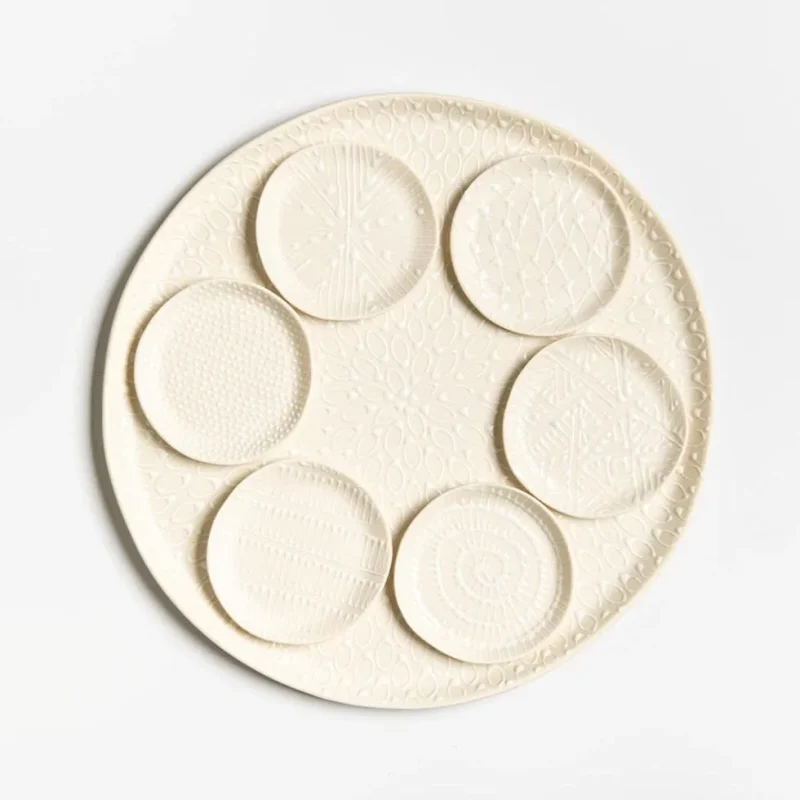 white on white seder plate by maiyan ben yona